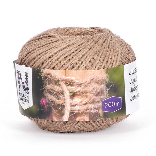 A spool of beige jute twine, wrapped in a cardboard tube with a label that includes the text 'Jute Twine' and 'Nelson Garden 2010'.