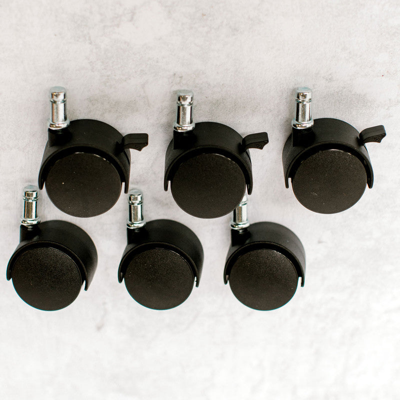 picture of 6 wheels of which 3 are lockable