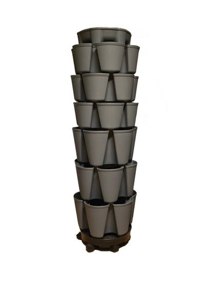 Stacked gray plan pot tower on a white background
