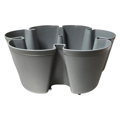 Gray planter with multiple compartments on a white background