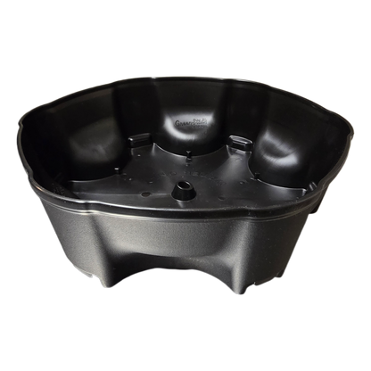 Round black plastic water reservoir for planter on a white background